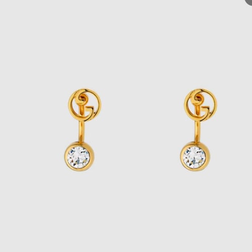 أقراط ذهبيه من قوتشي