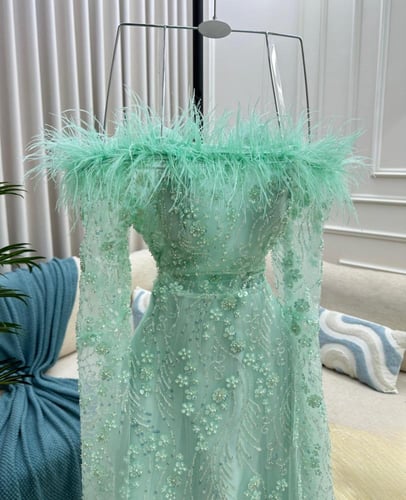 فستان لؤلؤ فيروزي