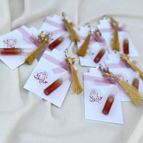 توزيعات العيد - توزيعات عود بخاخ بقاعدة اكريليك