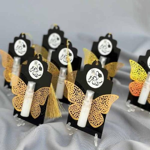 توزيعات تخرج مسك بخاخ بقاعدة اكريليك فراشة 12 حبة