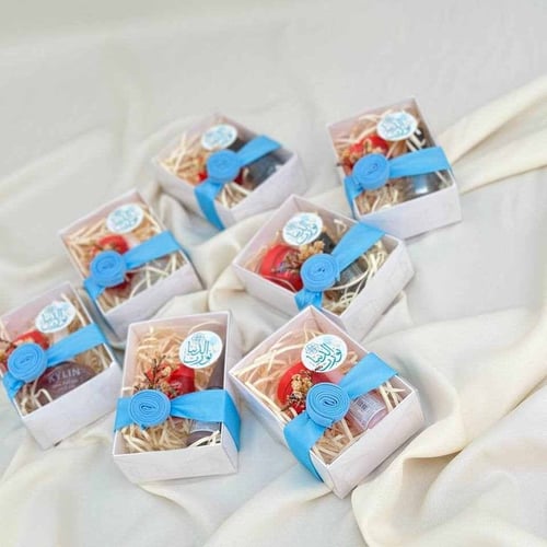 توزيعات مواليد أولاد - توزيعات مناكير ومرطب 12 حبة