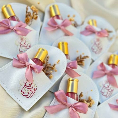 توزيعات مواليد بنات- توزيعات جلد ومسك فاخر 12 حبة