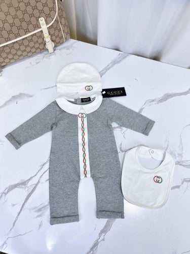 طقم مواليد gucci