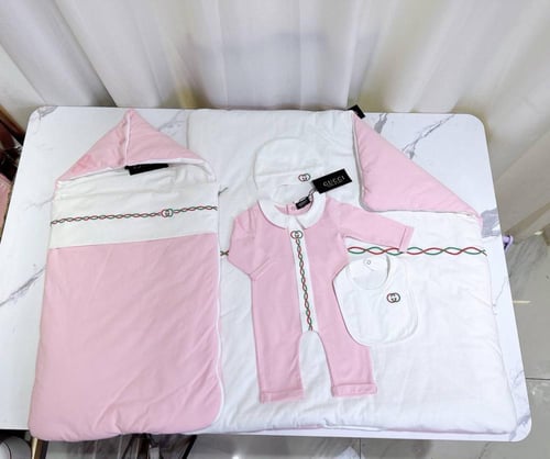 طقم مواليد gucci