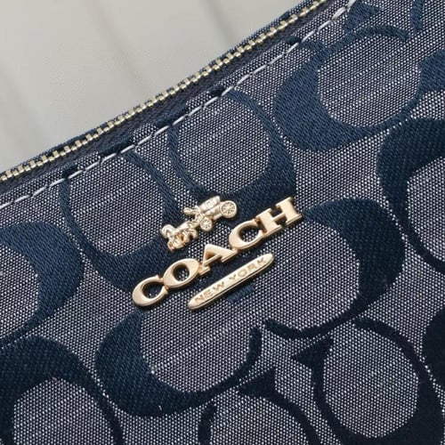 شنطه coach