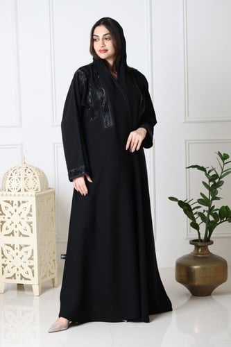 عبايه سوداء مزخرفه نص كلوش