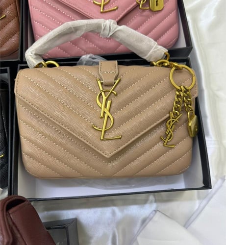 جديد سان لوران تعليقه ذهبي