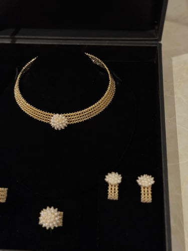 طقم دوريكا ذهبي مع اللؤلؤ