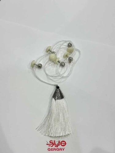 تركيبات عظم من ازراري باللون الاسود