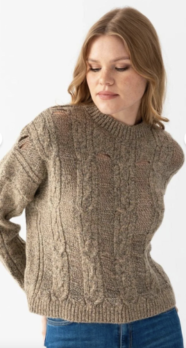 A knitted jacket with a round neckline and knitted...