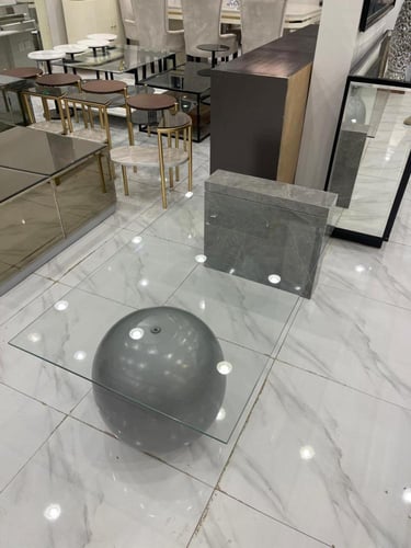 طاوله قاعده بديل رخام سطح زجاج