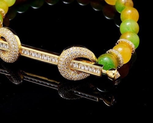 شوكر انيق من الاحجار والزركون الفاخر (لون المعدن ذ...