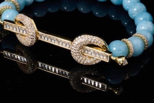 شوكر انيق من الاحجار والزركون الفاخر (لون المعدن ذ...