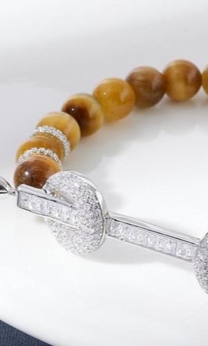 شوكر انيق من الاحجار والزركون الفاخر (لون المعدن ف...