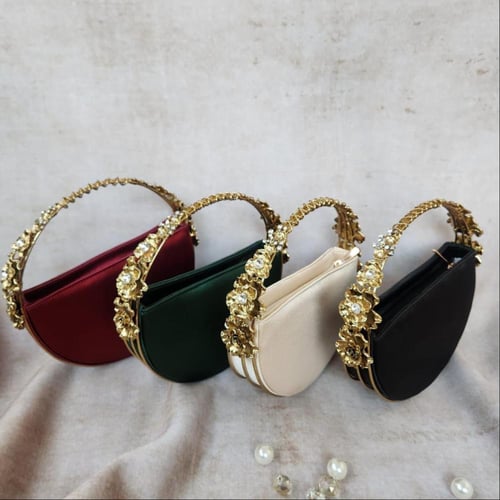 حقيبة سهرة فاخرة من الجلد الصناعي ومقبض من المعدن...