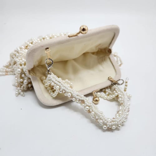 حقيبة سهرة فاخرة من اللؤلؤ الصناعي والشك اليدوي