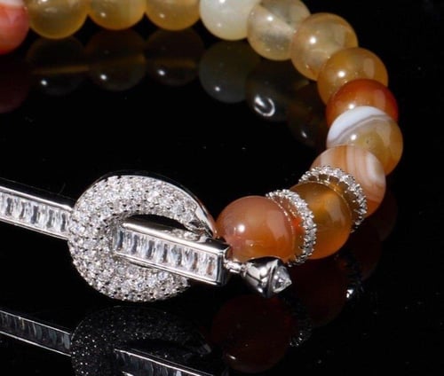 شوكر انيق من الاحجار والزركون الفاخر (لون المعدن ف...