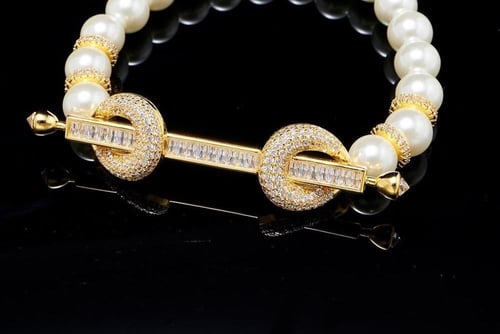 شوكر انيق من الاحجار والزركون الفاخر (لون المعدن ذ...