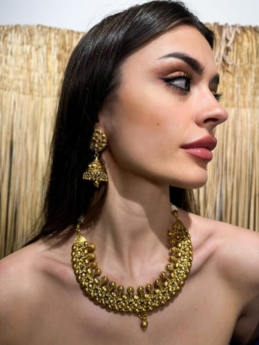 طقم مطلي هندي عبار عن عقد واقراط اذن