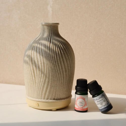 مرطب عطري بشكل مزھریة من السیرامیك
