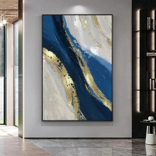 Abstract canvas painting in blue and gold