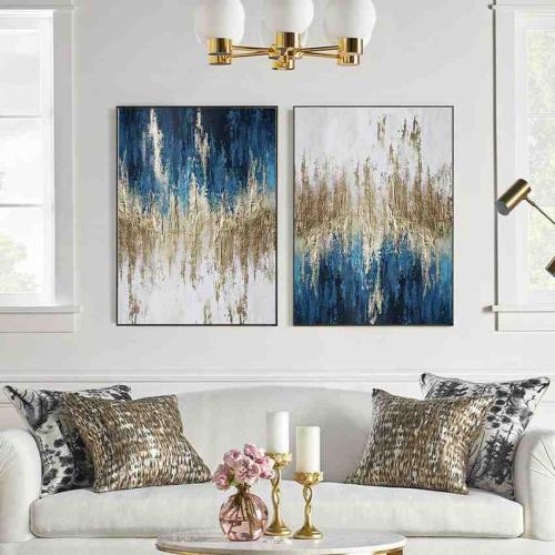 طقم لوحتين كانفس تجريدي بتدرجات الأزرق والذهبي الف...