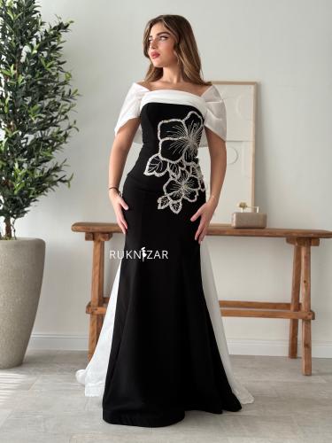 فستان كريب أسود بتطريز وذيل بليسية أبيض