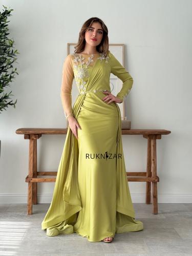 فستان فستقي ساتان بكسرات وتطريز فاخر