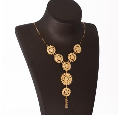 Jaber chair necklace 21 karat gold