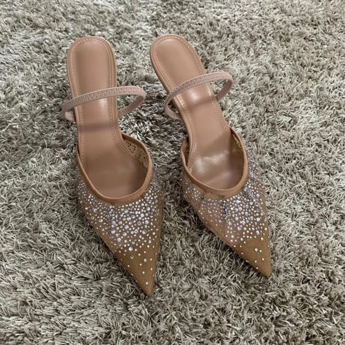 صنادل نسائية بكعب عالي