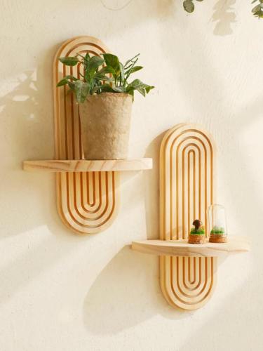 Wooden wall shelf with geometric boho design
