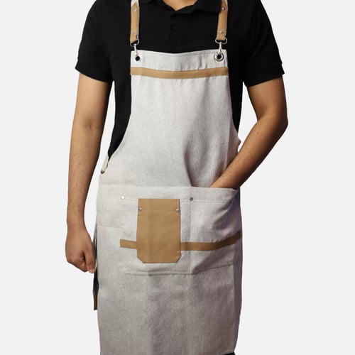 مريلة بلون بيج فاتح وجلد بني