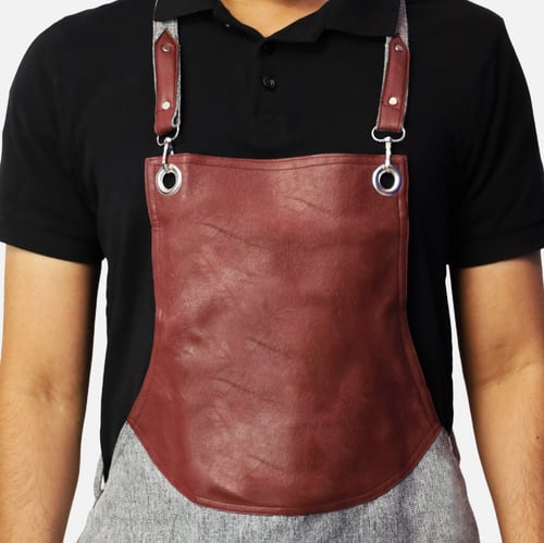 مريلة بلون رصاصي وجلد ماروني