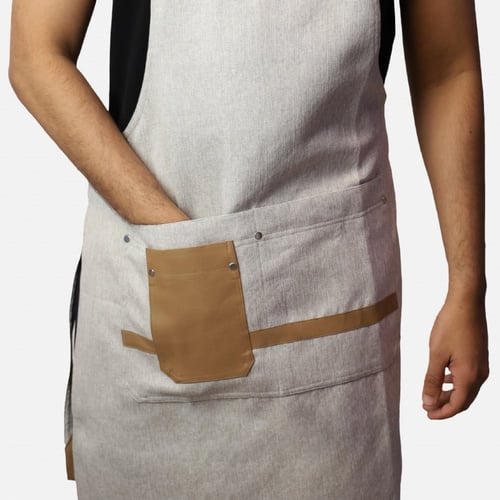 مريلة بلون بيج فاتح وجلد بني