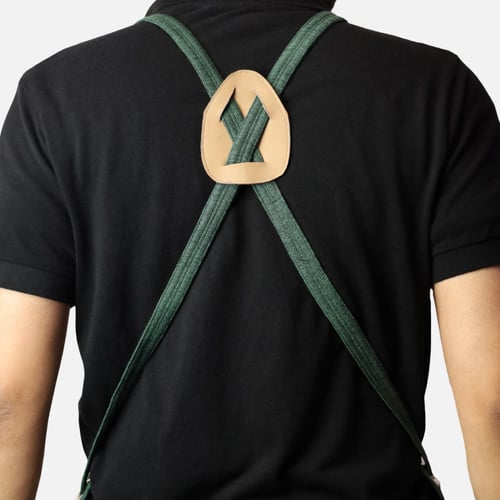 مريلة بلون اخضر وجلد بيج