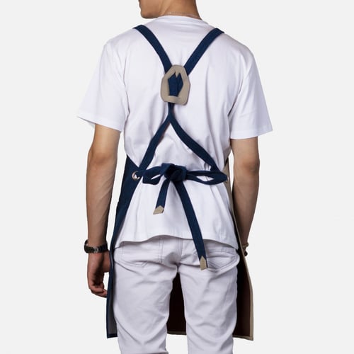 مريلة بلون كحلي مع جلد باللون البيج الكريمي