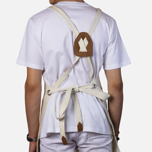 مريلة بلون بيج مع جلد باللون البني