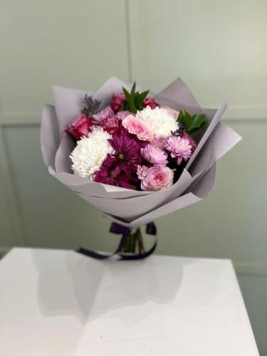 A beautiful bouquet of flowers with soft wrapping...