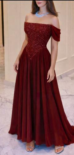 فستان سهرة نبيتي مطرز بالخرز والترتر