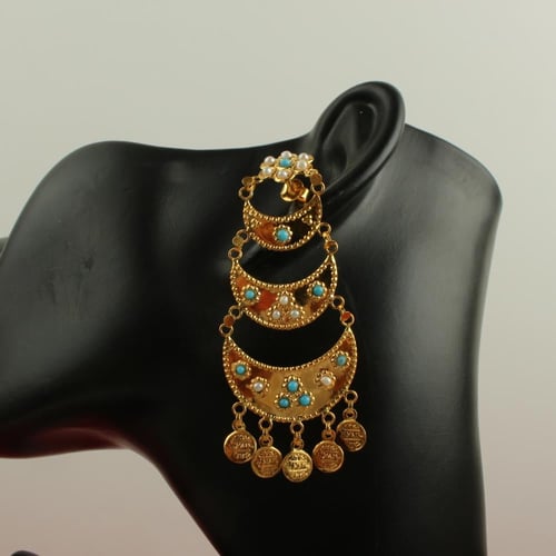 نصف ذهب عيار 21