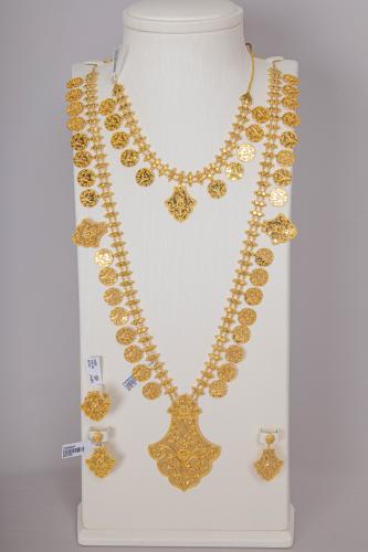 طقم سيتمي مع الخناقي ذهب تصميم بحريني عيار 21 الوز...