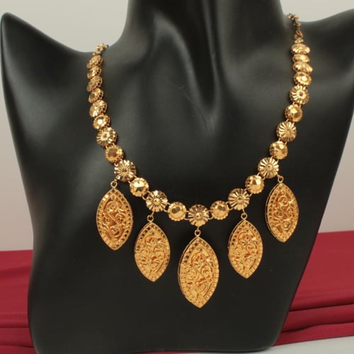 طقم ذهب تصميم عصري عيار 21 الوزن 35.22 جم