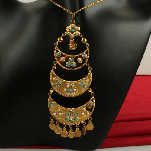 نصف ذهب عيار 21