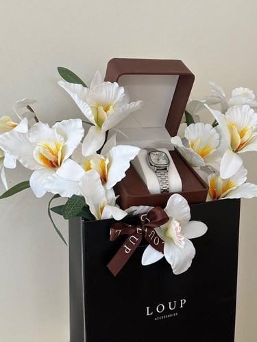 هدية ورد الاوركيد / مع ساعة نسائي من اختيارك