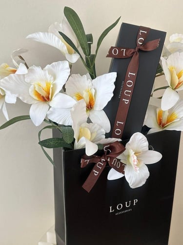 هدية ورد الاوركيد / مع قلم من اختيارك