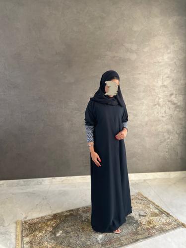 Navy crepe abaya and floral fabric on the sleeves
