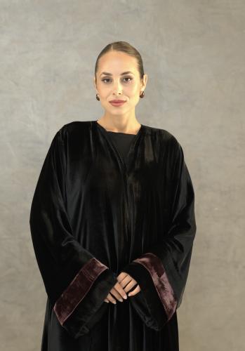 Black velvet abaya with a light maroon embroidery on the sleeves and the head covering