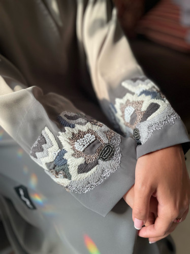 Gray crepe abaya with design on the sleeves