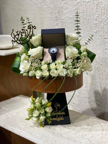 Eid stand with men's watch