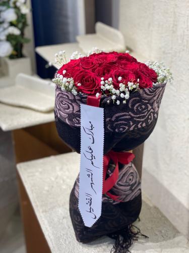 A bouquet with a Ramadan Kashmiri shawl